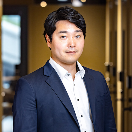 甚野 広行 氏
