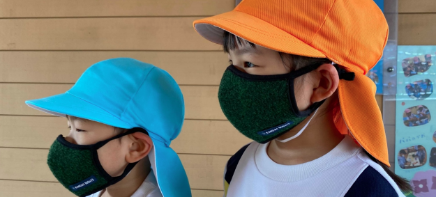 2021年7月6日（火）廃棄される未使用ポリエステル衣類のリサイクルでできた「SDGsマスク」を近畿大学附属幼稚園の園児全員に贈呈